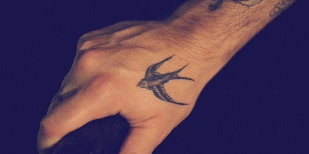 تاتو پرنده مردانه روی دست